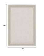 HomeRoots Polypropylene 7’x9’ Ivory and Gray Bordered Indoor Outdoor Area Rug