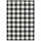 HomeRoots Polypropylene 5’x8’ Black and Ivory Gingham Indoor Outdoor Area Rug