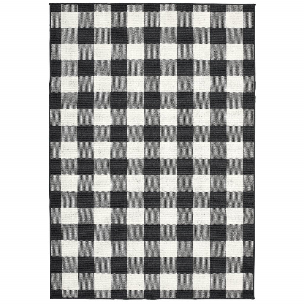 HomeRoots Polypropylene 9’x13’ Black and Ivory Gingham Indoor Outdoor Area Rug