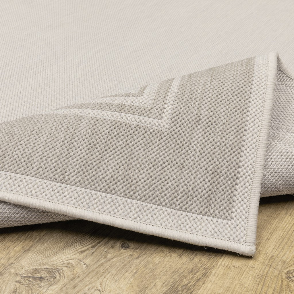 HomeRoots Polypropylene 8’x10’ Ivory and Gray Bordered Indoor Outdoor Area Rug