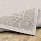 HomeRoots Polypropylene 8’x10’ Ivory and Gray Bordered Indoor Outdoor Area Rug
