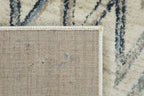 HomeRoots Ivory Heat-Set Polypropelene 3’ x 5’ Beige Blue Distressed Chevron Area Rug