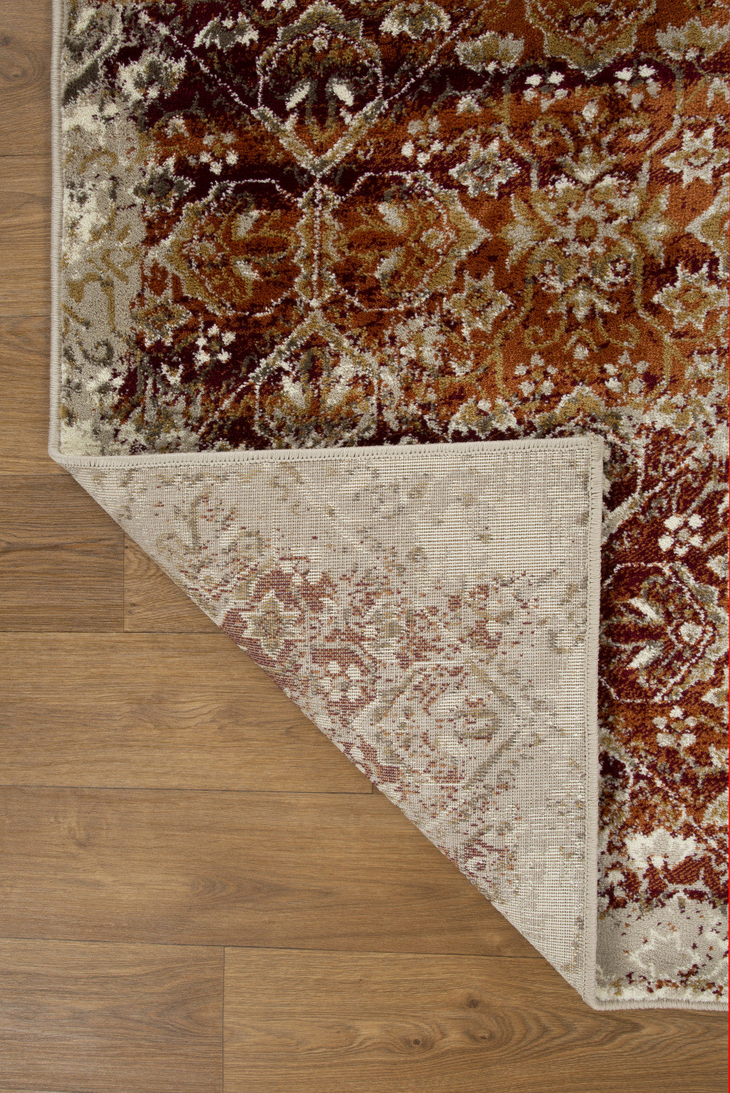 HomeRoots Ivory/Rust Heat-Set Polypropelene 5’ x 8’ Rust Ivory Distressed Diamonds Area Rug
