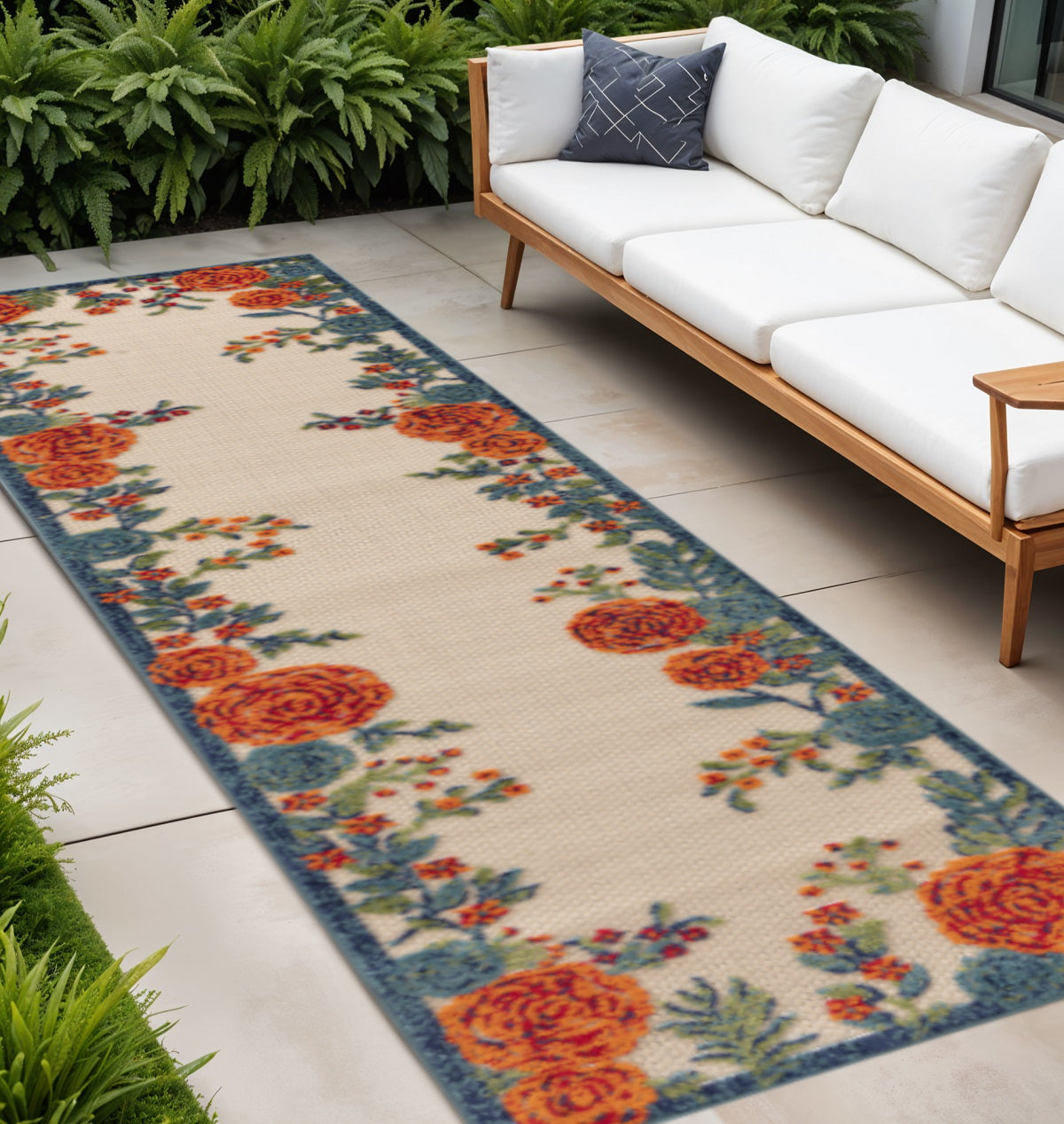 8 Ivory Orange And Blue Floral Indoor Outdoor Runner Rug