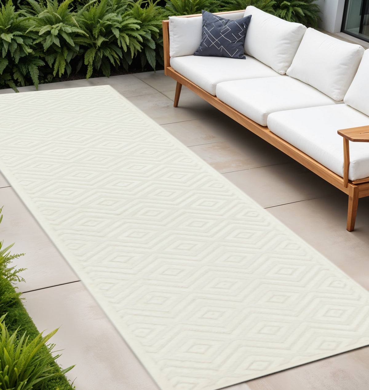 16 White And Ivory Geometric Indoor Outdoor Runner Rug