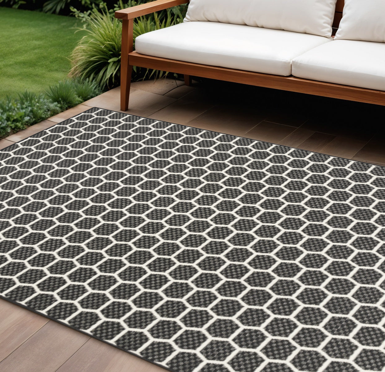 6 X 9 Black And Ivory Geometric Indoor Outdoor Area Rug