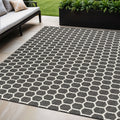 5 X 7 Black And Ivory Geometric Indoor Outdoor Area Rug