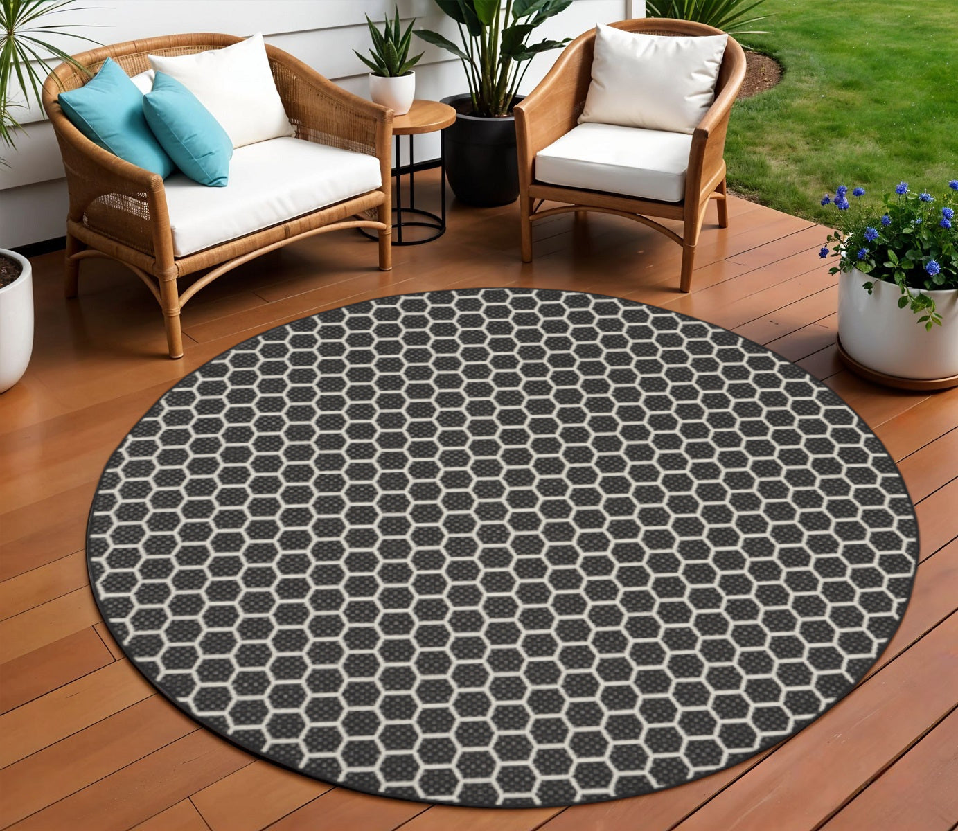 8 Black And Ivory Geometric Indoor Outdoor Area Rug