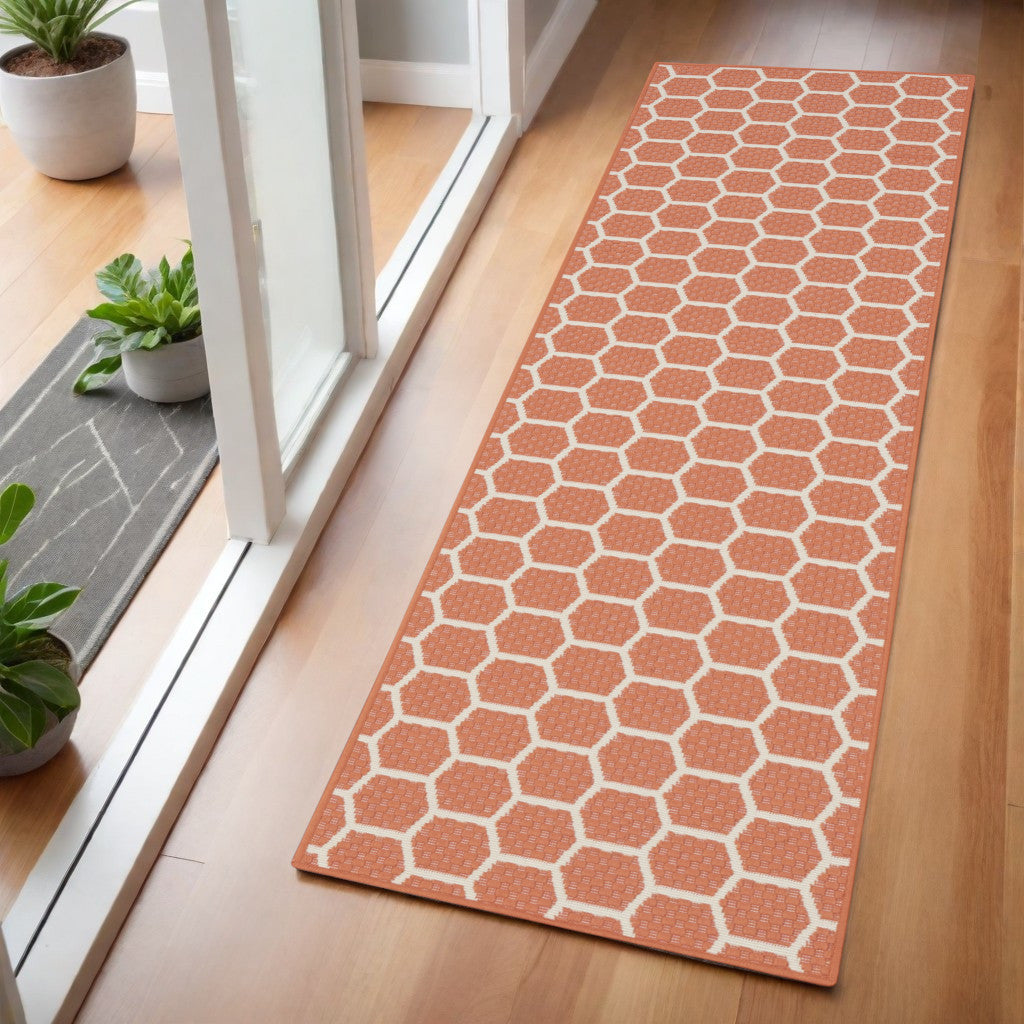 6 Coral And Ivory Geometric Indoor Outdoor Area Rug