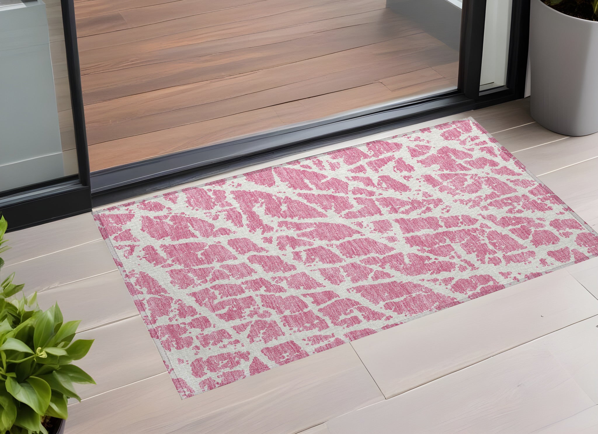 3' X 5' Pink And Ivory Abstract Washable Non Skid Indoor Outdoor Area Rug