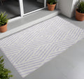 2' X 3' Lavender And Ivory Geometric Washable Non Skid Indoor Outdoor Area Rug
