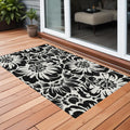 2' X 3' Black And Ivory Floral Washable Non Skid Indoor Outdoor Area Rug