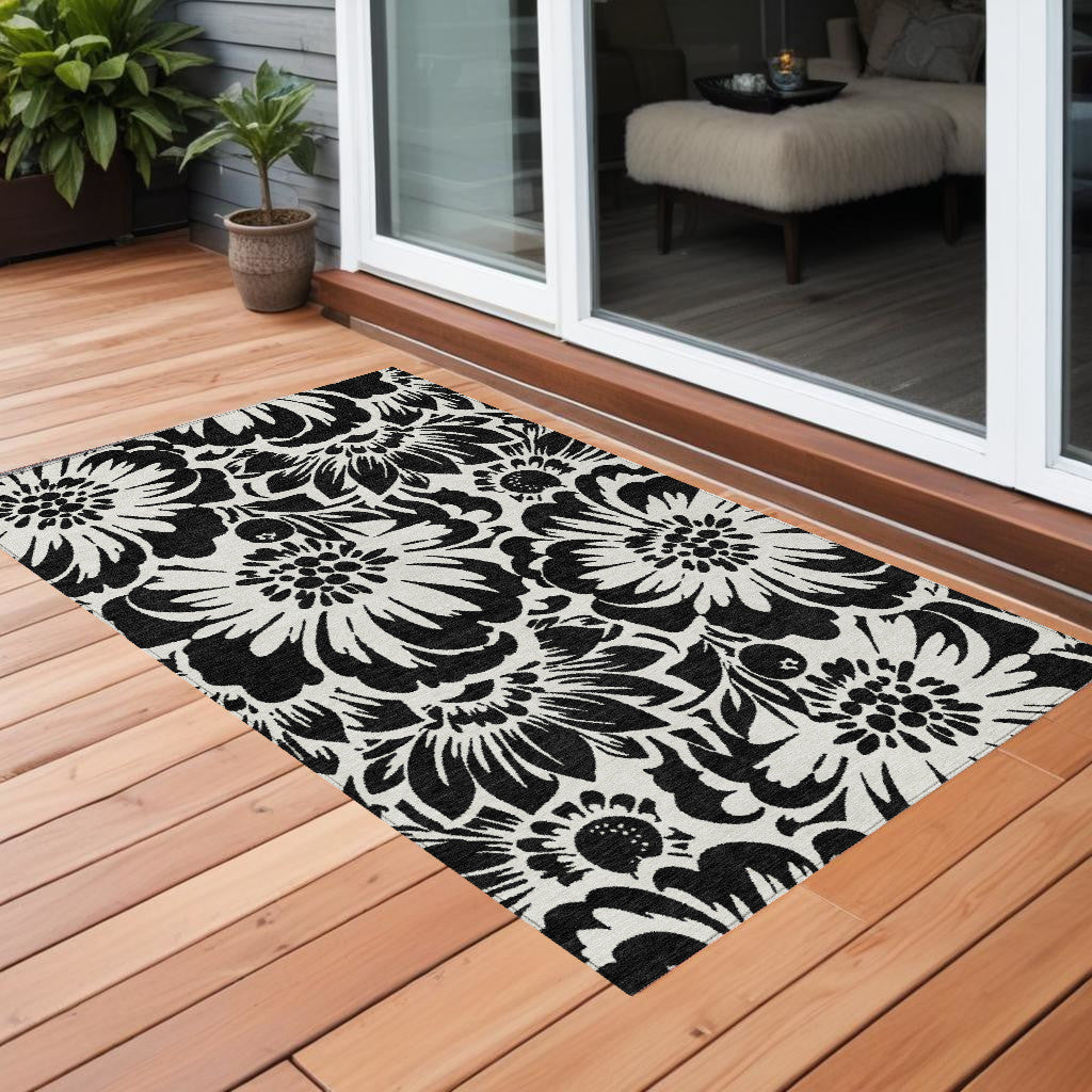 2' X 3' Black And Ivory Floral Washable Non Skid Indoor Outdoor Area Rug