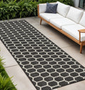 12 Black And Ivory Geometric Indoor Outdoor Runner Rug