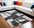 5' X 8' Black and Gray Abstract Hand Woven Area Rug