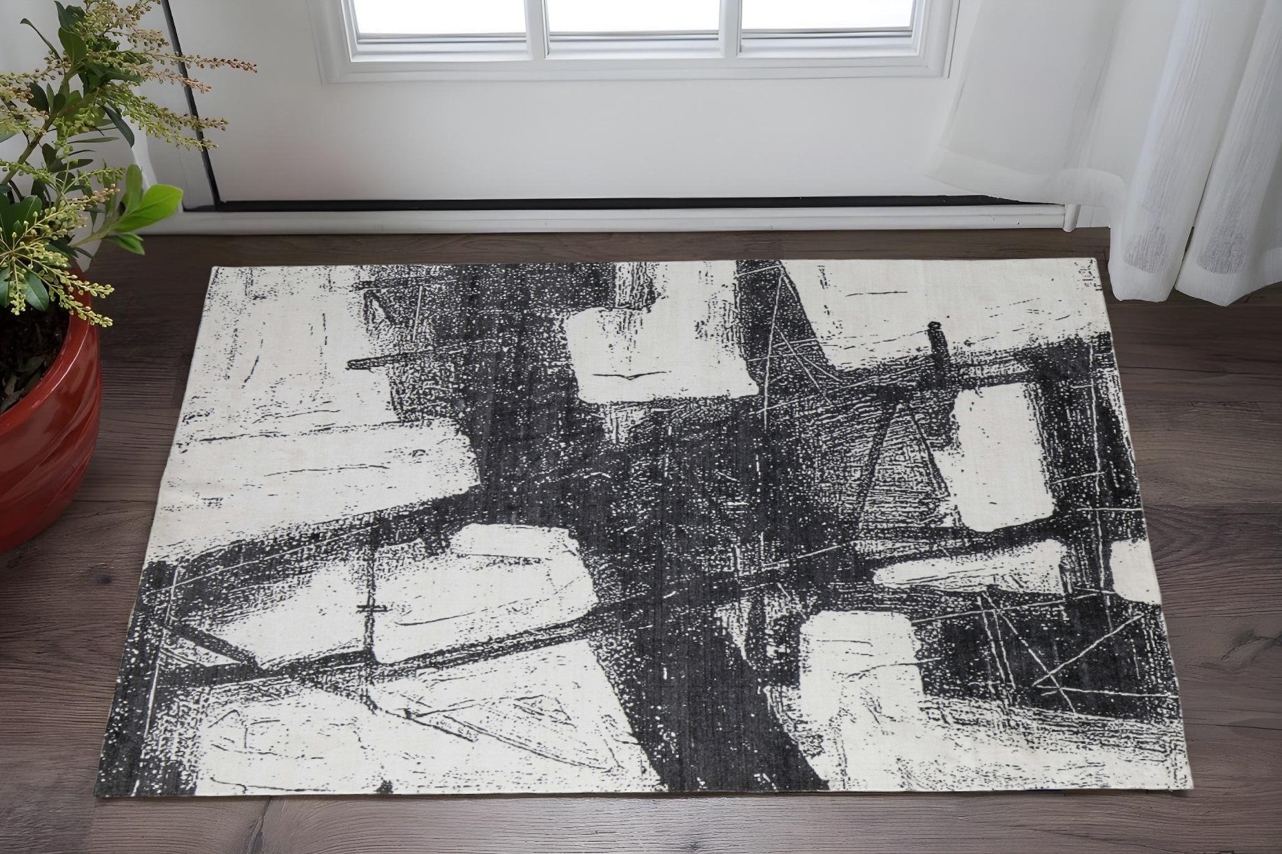 2' X 3' Black and Gray Abstract Hand Woven Area Rug