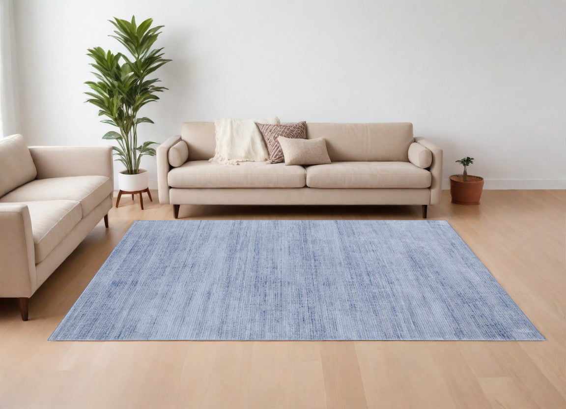 7' X 10' Blue and Ivory Power Loom Area Rug