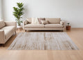 8' X 10' Ivory and Tan Abstract Power Loom Worn Faded Area Rug