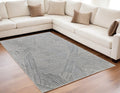 5' X 8' Green and Ivory Abstract Hand Woven Area Rug