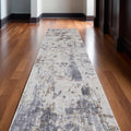 10' Ivory Gray and Blue Abstract Power Loom Worn Faded Runner Rug