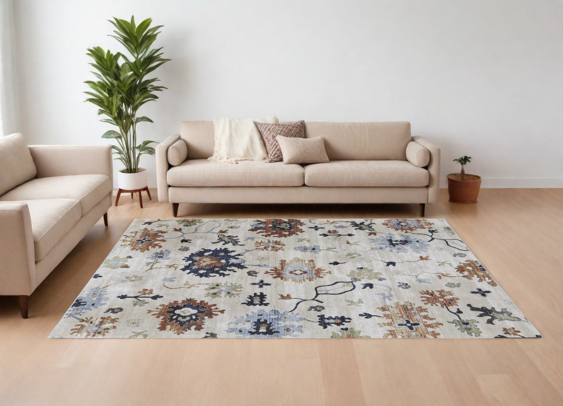 7' X 10' Ivory Red and Blue Floral Power Loom Area Rug