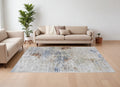 9' X 13' Red Blue and Ivory Abstract Power Loom Area Rug