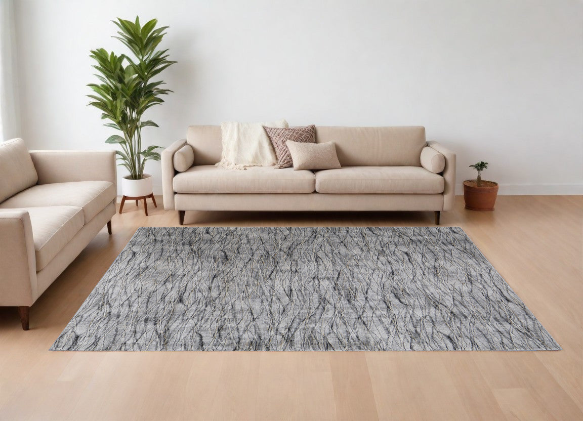 7' X 10' Gray Ivory and Tan Abstract Power Loom Area Rug