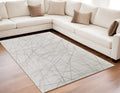 5' X 8' Gray and Ivory Abstract Hand Woven Area Rug