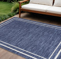 7 X 10 Navy Blue And Ivory Indoor Outdoor Area Rug