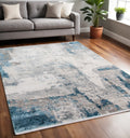 5 X 8 Gray Blue And Ivory Abstract Area Rug With Fringe