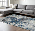 9 X 12 Ivory Teal And Black Abstract Area Rug