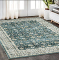 5' X 7' Teal And Ivory Oriental Distressed Area Rug