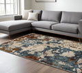 7' X 10' Beige Rust And Teal Abstract Distressed Area Rug With Fringe