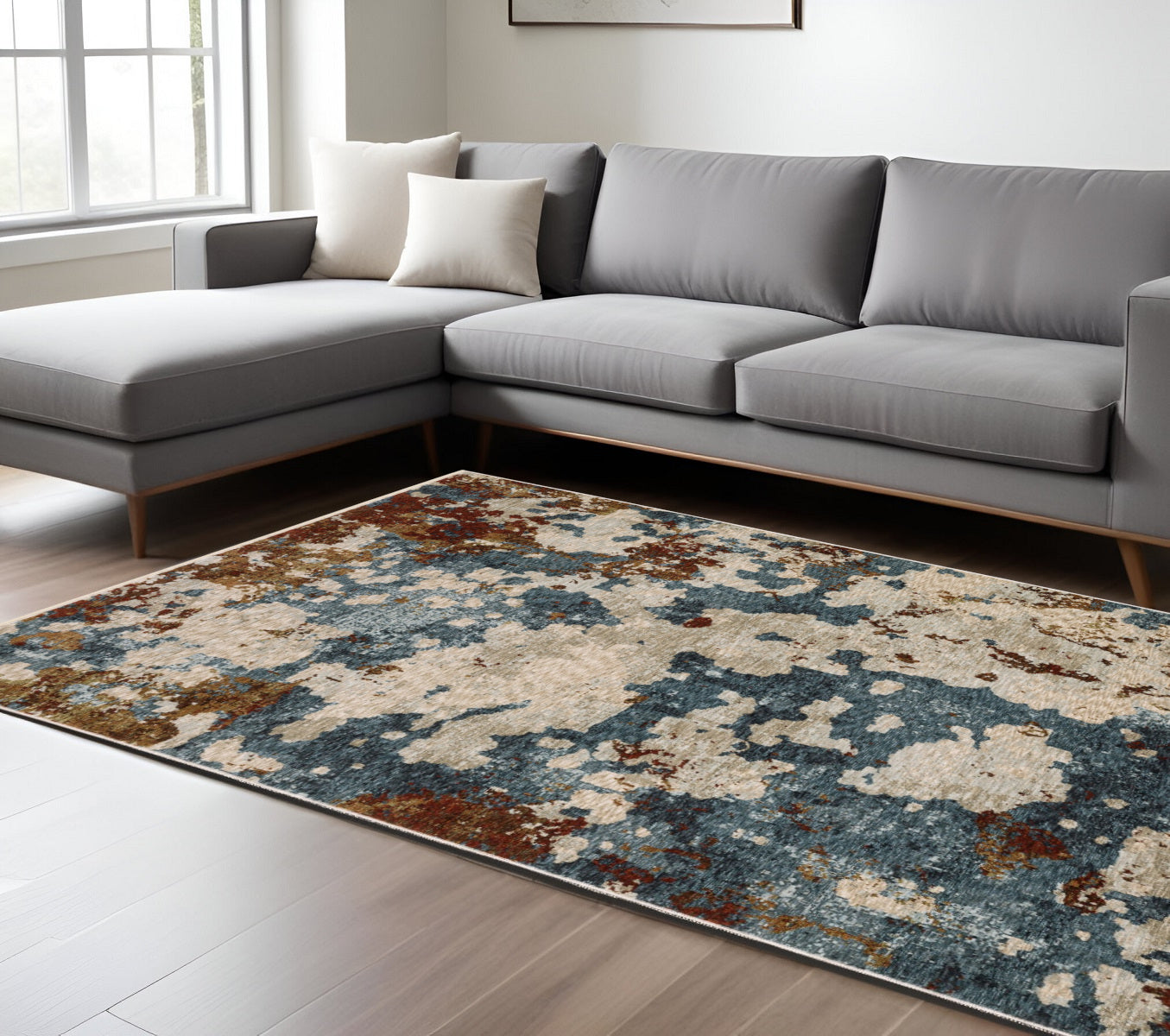 7' X 10' Beige Rust And Teal Abstract Distressed Area Rug With Fringe