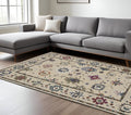 7' X 10' Ivory Blue And Light Brown Floral Area Rug With Fringe