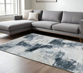 8' X 10' Ivory And Gray Abstract Distressed Area Rug