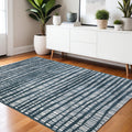 4' X 6' Teal And Ivory Striped Distressed Area Rug
