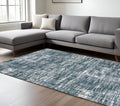 8' X 11' Gray And Ivory Geometric Area Rug