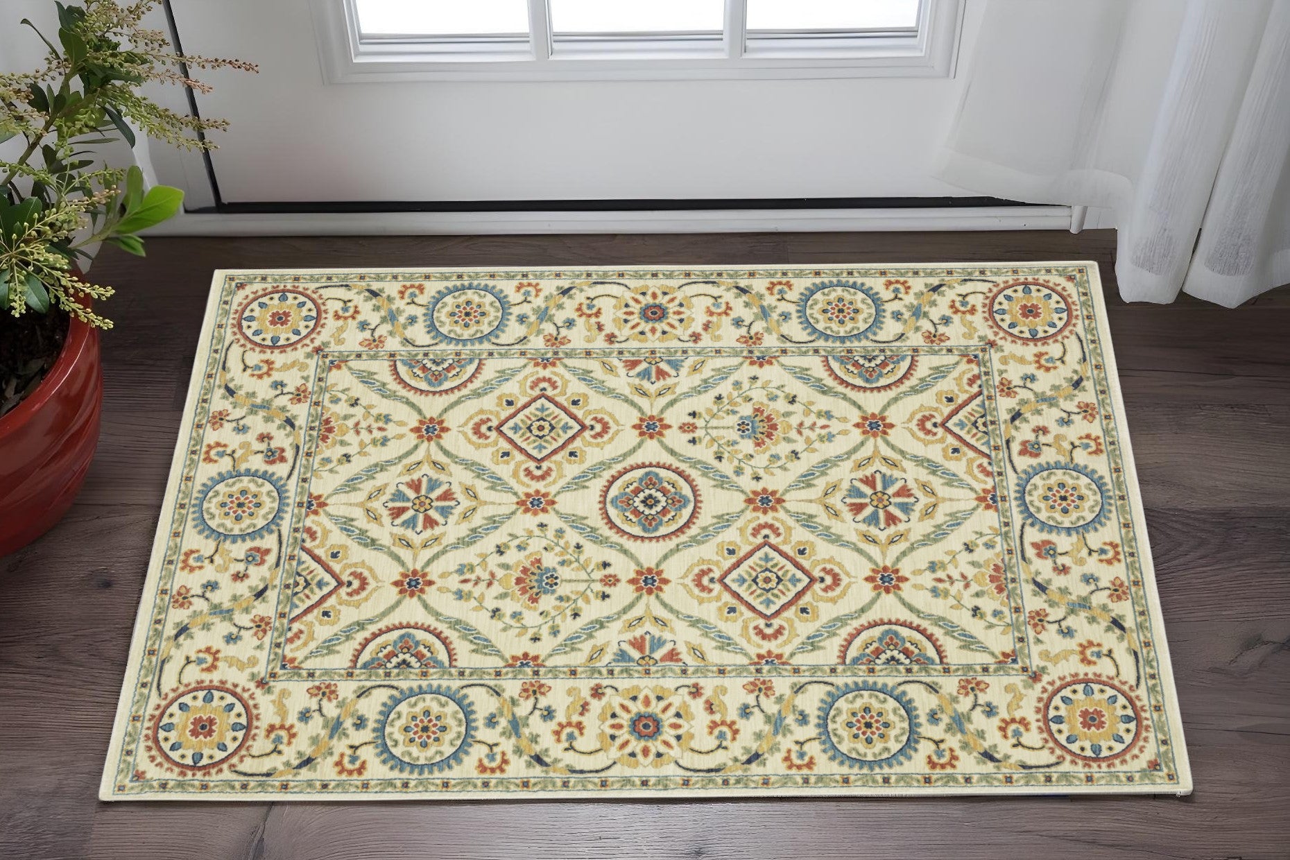 2' X 3' Ivory Orange And Blue Oriental Area Rug With Fringe