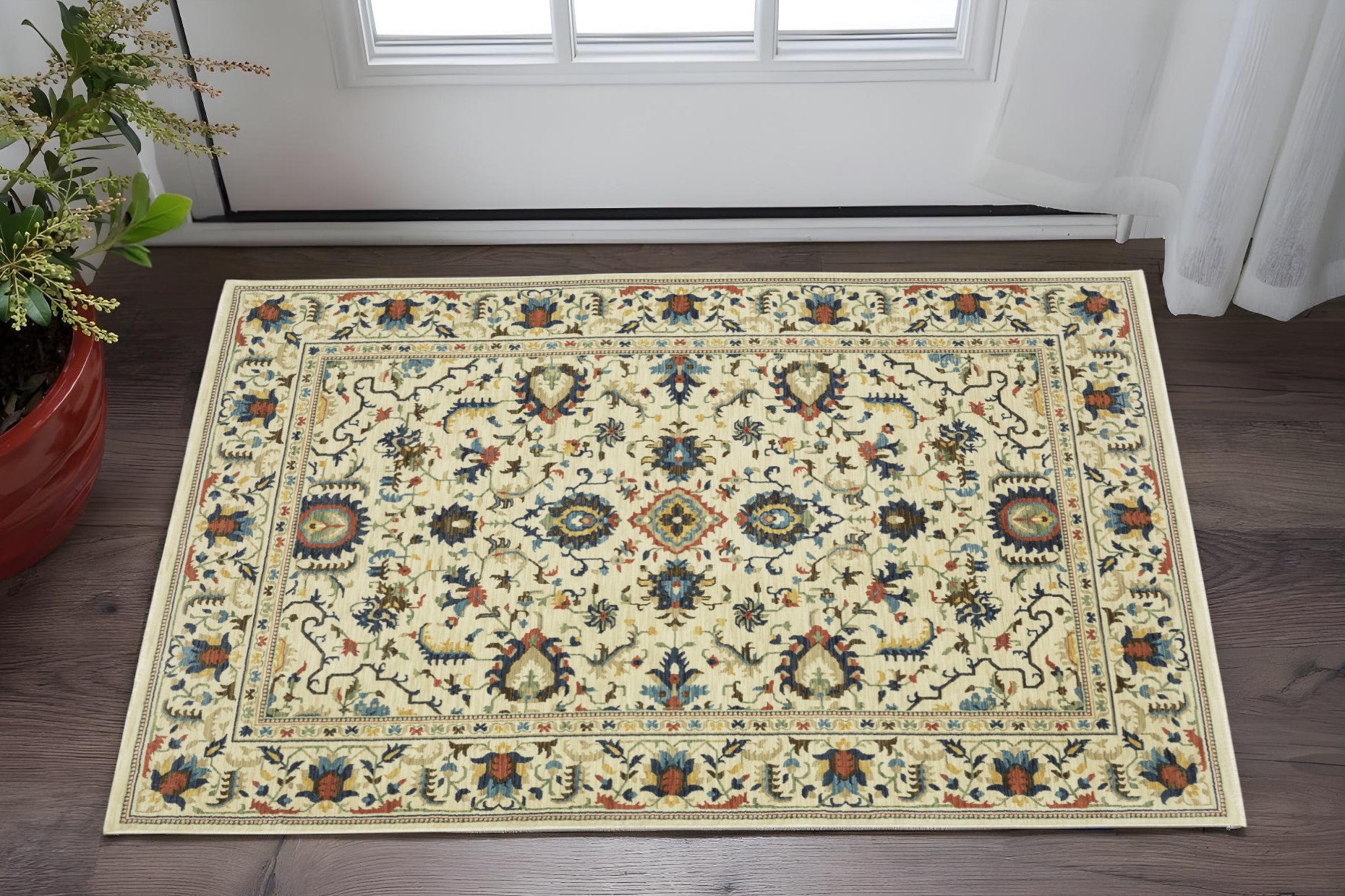 2' X 3' Ivory Blue And Orange Oriental Area Rug With Fringe