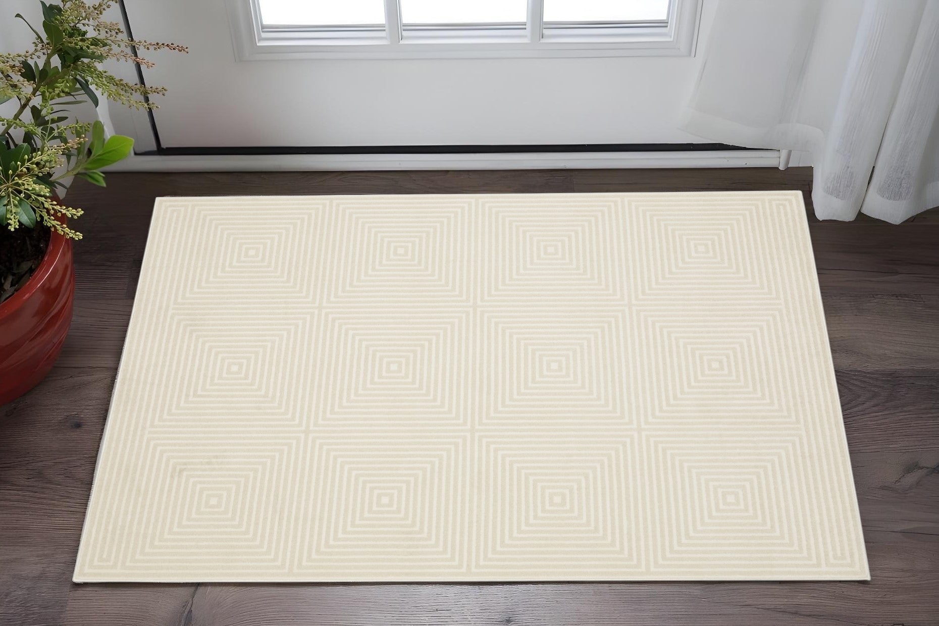 3' X 5' Ivory And Beige Geometric Area Rug