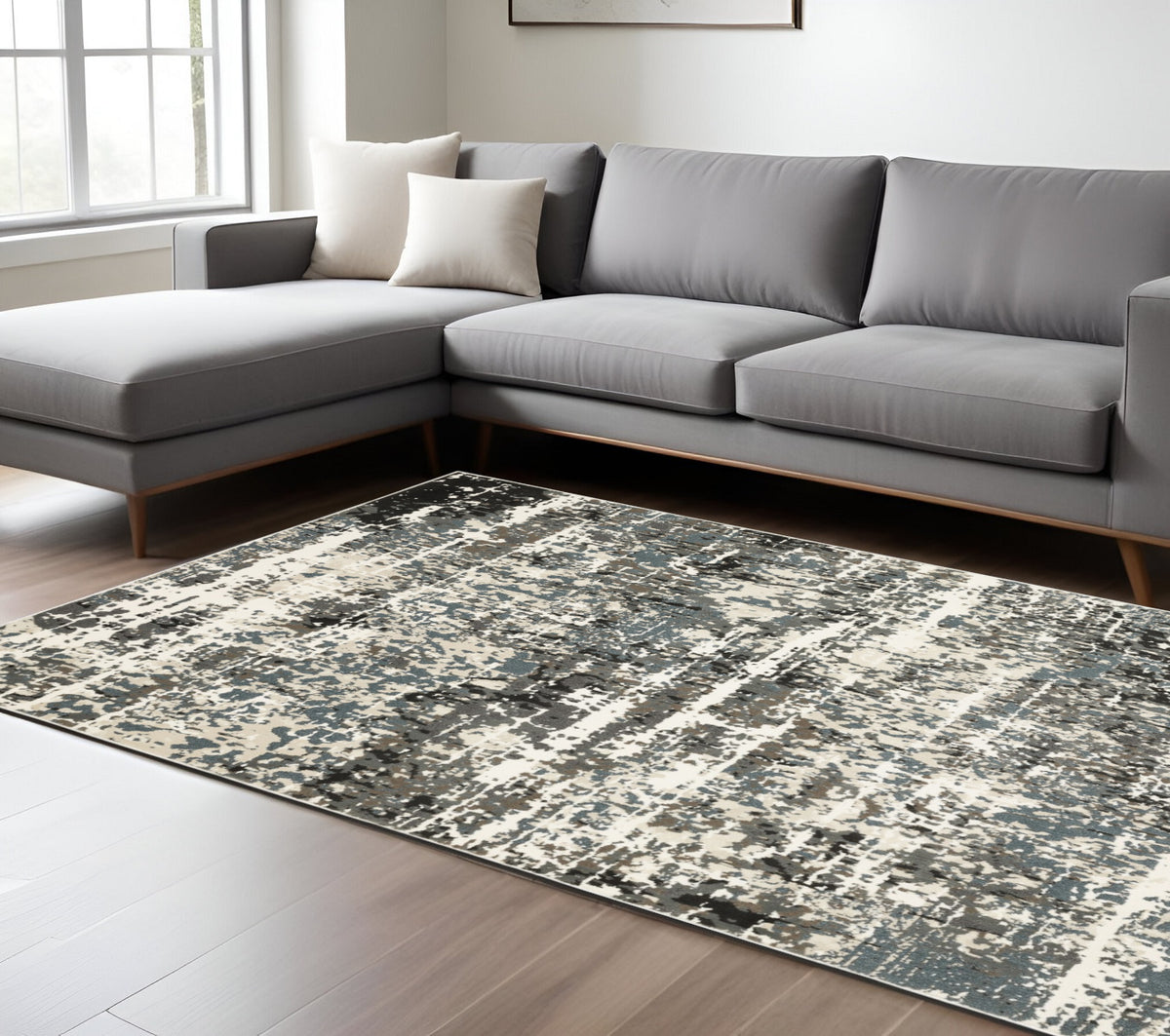7' X 10' Ivory And Gray Abstract Area Rug