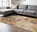 7' X 10' Beige Pink And Yellow Abstract Area Rug With Fringe