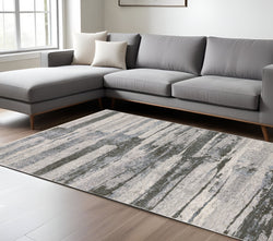 10' X 13' Gray And Ivory Abstract Area Rug With Fringe