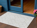 3' X 5' Ivory Beige And Tan Geometric Washable Indoor Outdoor Area Rug