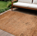9' X 12' Copper Orange And Brown Oriental Washable Indoor Outdoor Area Rug