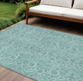10' X 14' Teal Blue And Aqua Floral Washable Indoor Outdoor Area Rug