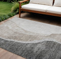10' X 14' Charcoal Gray And Taupe Abstract Washable Indoor Outdoor Area Rug