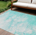 8' X 10' Aqua Ivory And Teal Blue Abstract Washable Indoor Outdoor Area Rug