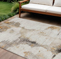 10' X 14' Beige Ivory And Taupe Abstract Washable Indoor Outdoor Area Rug